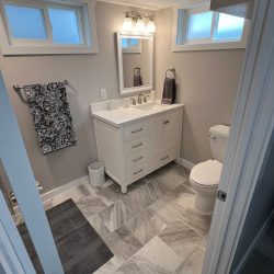 A newly remodeled basement bathroom in a residential home.